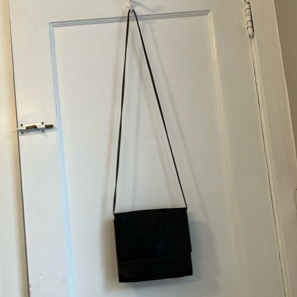 Hans Koch LTD SOHO New York, 100% textured leather, dark brown purse.